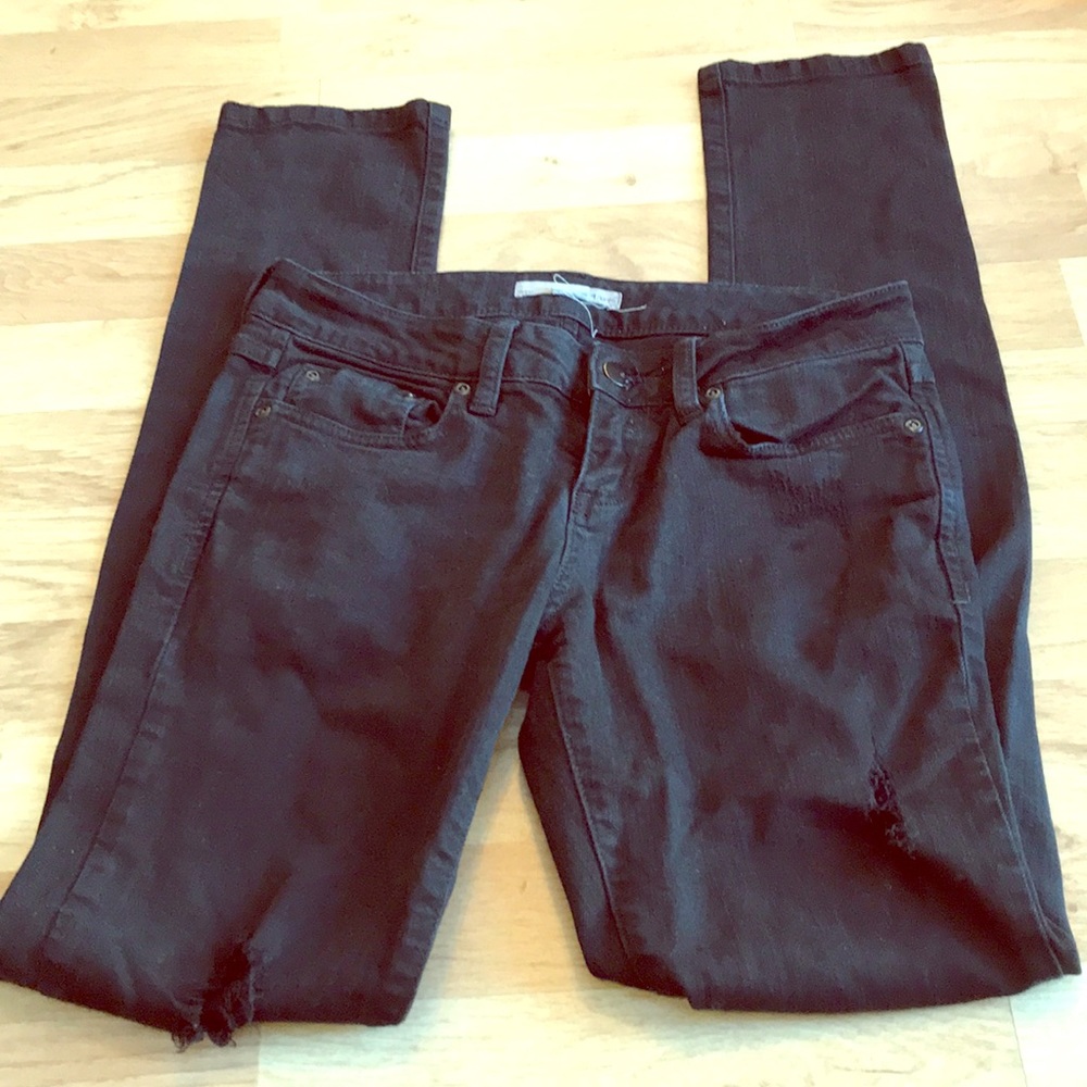Black skinny jeans with holes